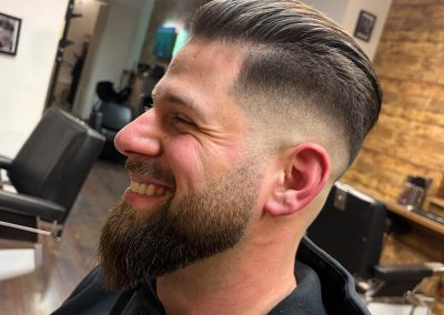 slicked back undercut plus beard trim
